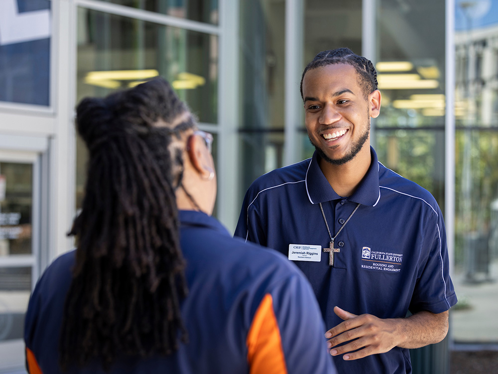 Jeremiah Riggins '24 converses with Dr. LaTosha Traylor, assistant professor of sociology.